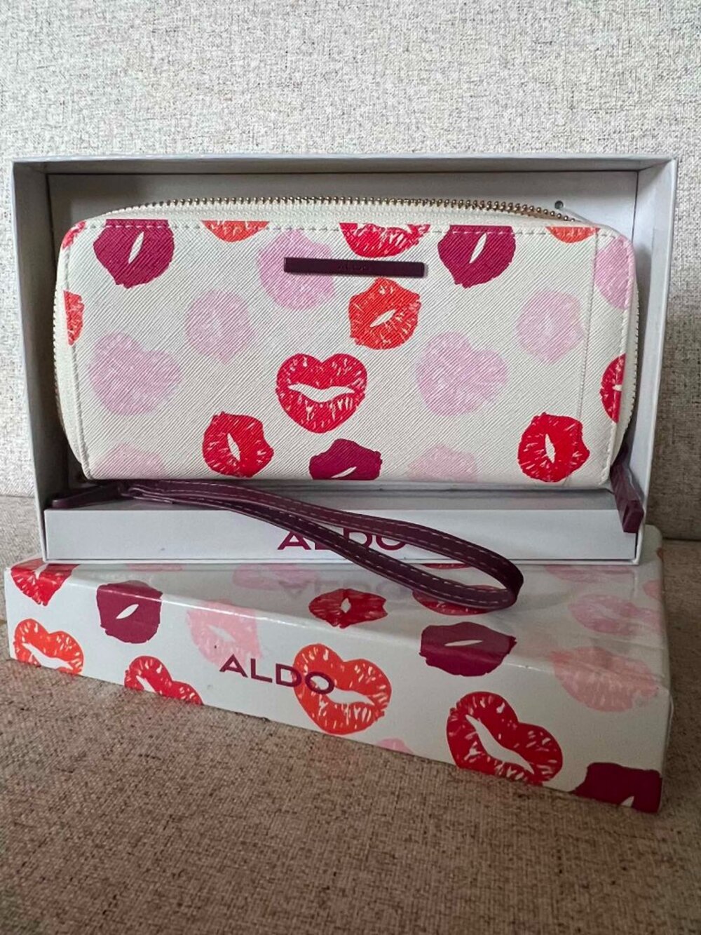 Aldo "Aroa Kiss" Wristlet Cream Texture Red Plum Pink